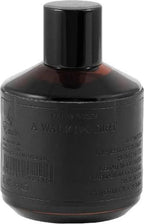 Der edle, dunkelbraune Flakon des Emir A Walk on Dirt 100ml Eau de Parfum mit markantem schwarzem Etikett, freigestellt auf weißem Hintergrund.