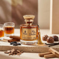Der elegante, goldbraune Flakon von Emir Fire Your Desire, umgeben von Cognac, Zimtstangen, Pralinen und Vanilleschoten.