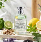 Der cleane Apotheker-Glasflakon von Emir Ultra Citrus, umgeben von frischem Zitrus, Bergamotte, Lavendel und Vetiverwurzeln.