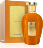 Das Emir Voux Patisserie 100ml Unisex Parfum neben der dazugehörigen luxuriösen, orange-goldenen Originalverpackung.