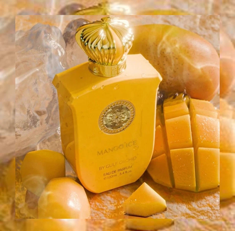 Der leuchtend gelbe Flakon von Gulf Orchid Mango Ice mit goldener Krone, erfrischend umgeben von frischen Mangostücken und Eiswürfeln.