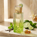 Stilvolle Präsentation des Gulf Orchid Mojito Obsession Flakons auf hellem Stein, sommerlich umgeben von frischen Limettenhälften und kühlenden Minzblättern.