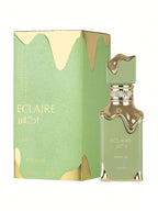 Das Lattafa Eclaire Pistache 100ml Damen Parfum präsentiert neben der dazugehörigen leuchtend grünen Originalverpackung mit goldenen Akzenten.