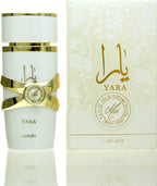 Das Lattafa Yara Moi 100ml Damen Parfum neben der dazugehörigen edlen, weißen Originalverpackung mit floralen, goldenen Verzierungen.